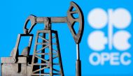 A 3D-printed oil pump jack is seen in front of the OPEC logo in this illustration picture, on April 14, 2020. File Photo / Reuters
