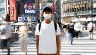 Shoji Morimoto who charges 10,000 yen ($71.30) an hour to accompany clients and simply exist as a companion, poses at Shibuya crossing in Tokyo, Japan August 31, 2022. REUTERS/Kim Kyung-Hoon