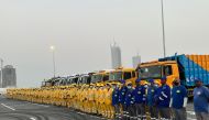 Members of cleaning teams, vehicles and machines that participated in cleaning operation of Lusail Stadium.  