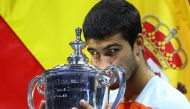 September 11, 2022 Spain's Carlos Alcaraz celebrates with the trophy after winning the U.S. Open REUTERS/Mike Segar