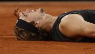 June 3, 2022 Germany's Alexander Zverev reacts after sustaining an injury during his semi final match against Spain's Rafael Nadal REUTERS/Yves Herman/Files


