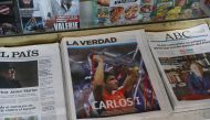Spain's Carlos Alcaraz is pictured on the front page of a newspaper after winning the US Open final against Norway's Casper Ruud in Murcia, Spain, on September 12, 2022  REUTERS/Violeta Santos Moura