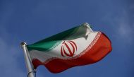 The Iranian flag waves in front of the International Atomic Energy Agency (IAEA) headquarters, before the beginning of a board of governors meeting in Vienna, Austria, on March 1, 2021. File Photo / Reuters
