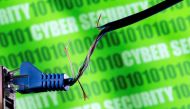 Broken Ethernet cable is seen in front of binary code and words 