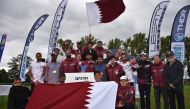 Members of the Qatari Paramotor Team celebrate after winning the Paramotor World Championship (Slalom) in Czech Republic.