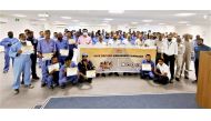 Participants pose for a group photo during the annual Safe Driving Awareness campaign.