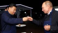 Russian President Vladimir Putin and Chinese President Xi Jinping toast during a visit to the Far East Street exhibition on the sidelines of the Eastern Economic Forum in Vladivostok, Russia, on September 11, 2018. File Photo / Reuters