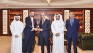 Ali Hamad Al Mesaifri, Head of HR and Administrative Affairs Sector at QIIB, Mohammad Khair Barhoma, Chief Operations Officer at QIIB, and Citibank’s Mohamed Galadari, Vice-President (Financial Institutions), with other officials, during the award presentation, in Doha, recently.   