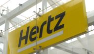 Signage is seen at Hertz rental car at John F. Kennedy International Airport in Queens, New York City, on  March 30, 2022. File Photo / Reuters
