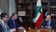 Lebanon's President Michel Aoun meets with a delegation from the International Monetary Fund at the presidential palace in Baabda, Lebanon, on September 21, 2022. Dalati Nohra/Handout via REUTERS