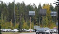 Cars queue to enter Finland from Russia at Finland's most southern crossing point Vaalimaa, around three hour drive from Saint Petersburg, in Vaalimaa, Finland September 23, 2022. REUTERS/Janis Laizans