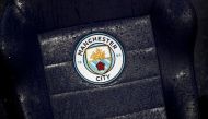 General view of a Manchester City badge on a rain soaked seat before a match against West Ham United at the Etihad Stadium in Manchester on February 19, 2020. File Photo / Reuters
