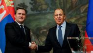 Russian Foreign Minister Sergei Lavrov shakes hands with Serbian Foreign Minister Nikola Selakovic during a news conference following their meeting in Moscow, Russia April 16, 2021. Yuri Kochetkov/Pool via Reuters