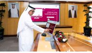 Minister of Justice H E Masoud bin Mohammed Al Amri launching the online portal of legal and judicial studies.
