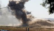 Smoke rises from the Iraqi Kurdistan headquarters of the Kurdistan Freedom Party (PAK), after Iran's Revolutionary Guards' strike on the outskirts of Kirkuk, Iraq, on September 28, 2022. REUTERS/Ako Rasheed REFILE-CORRECTING PARTY