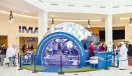 Mall visitors participate in QNB’s FIFA World Cup Qatar 2022 campaign. 