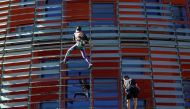 French climber Alain Robert, also known as 