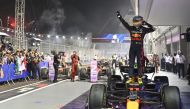 Red Bull's Sergio Perez celebrates after winning the Singapore Grand Prix at the Marina Bay Street Circuit, Singapore, on October 2, 2022. (REUTERS/Caroline Chia)