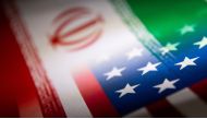 Iran and US flags are seen printed on paper in this illustration taken January 27, 2022. (REUTERS/Dado Ruvic)