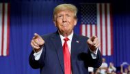 Former US President Donald Trump gestures during a rally in Warren, Michigan, on October 1, 2022. REUTERS/Chery Dieu-Nalio 