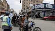 People ride on motorbikes on a street in Sanaa, Yemen, on August 1, 2022. File Photo / Reuters
