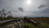 A destroyed Russian tank is seen on a road, amid Russia's attack on Ukraine, in Kharkiv region, Ukraine October 2, 2022. Reuters/Vladyslav Musiienko