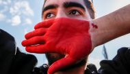 A protestor performs during a demonstration following the death of Mahsa Amini in Iran, in Istanbul, Turkey, October 2, 2022. Reuters/Dilara Senkaya