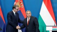 Serbian President Aleksandar Vucic and Hungarian Prime Minister Viktor Orban hold a joint news conference in Budapest, Hungary, on October 3, 2022. REUTERS/Bernadett Szabo