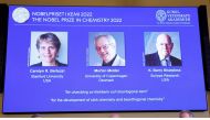 Screens show winners Carolyn R. Bertozzi (US), Morten Meldal (Denmark) and K Barry Sharpless (US) of the 2022 Nobel Prize in Chemistry during a news conference at The Royal Swedish Academy of Sciences in Stockholm, Sweden, October 5, 2022. TT News Agency/Christine Olsson via Reuters 