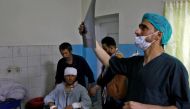 A medic checks an X-ray film of a man who was wounded after a suicide bomber detonated explosives near the entrance of the Russian embassy, inside a hospital in Kabul, Afghanistan, on September 5, 2022. File Photo / Reuters
