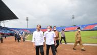 Indonesian President Joko Widodo (left) and Chairman of the Indonesian Football Association Mochamad Iriawan visited Kanjuruhan Stadium in Malang, East Java province, Indonesia, on October 5, 2022. (Indonesia's Presidential Palace/Handout via REUTERS) 