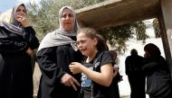 Mourners attend the funeral of Palestinian Mahmoud Al-Sous, who was killed by Israeli forces during clashes in raid, in Jenin in the Israeli-occupied West Bank on October 8, 2022. REUTERS/Raneen Sawafta