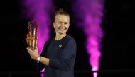 Czech Republic's Barbora Krejcikova celebrates with the trophy after winning the singles final of the Ostrava Open against Poland's Iga Swiatek at the CEZ Arena, Ostrava, Czech Republic, on October 9, 2022. REUTERS/David W Cerny