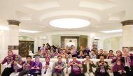 Indonesian Ambassador to Qatar H E Ridwan Hassan (seventh from left) with other participants during ‘The Journey of Caring’ talk show held at the embassy.