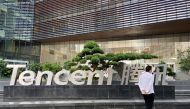 A man walks outside the Tencent headquarters in Nanshan district of Shenzhen, Guangdong province, China, September 2, 2022. REUTERS/David Kirton