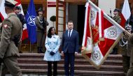 Canadian Defence Minister Anita Anand and her Polish counterpart Mariusz Blaszczak review the honor guard during a welcoming ceremony in Warsaw, Poland October 11, 2022. REUTERS/Kuba Stezycki