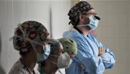 Doctors attend a surgery procedure to perform the first-ever multi-visceral intestinal transplant from a controlled pediatric donor in asystole to a 13-month baby girl, in Madrid, Spain, in this undated handout image obtained by Reuters on October 11, 2022. 