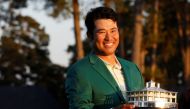 Japan's Hideki Matsuyama celebrates with the green jacket and the trophy after winning The Masters at the Augusta National Golf Club in Augusta, Georgia, US, on April 11, 2021.  File Photo / Reuters