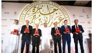 H E Abdullah bin Hamad Al Attiyah with the winners of this year's Al Attiyah International Lifetime Energy Awards, during the ceremony of honouring winners at the Sheraton Grand Doha Resort & Convention Hotel, yesterday. 