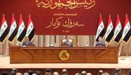 Iraqi lawmakers attend a parliamentary session to vote for a new head of state president in Baghdad, Iraq, on October 13, 2022. Iraqi Parliament Media Office/Handout via REUTERS