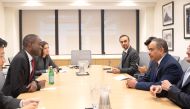 Minister of Finance H E Ali bin Ahmed Al Kuwari (right) with US Deputy Secretary of Treasury H E Wally Adeyemo (left), and other officials, on the sidelines of the World Bank Group (WBG) and the International Monetary Fund (IMF) meetings, in Washington, DC, recently. 