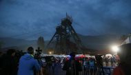 Media members report outside the coal mine as search and rescue operation continues after an explosion, in Amasra in the northern Bartin province.
