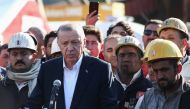 Turkish President Tayyip Erdogan talks to media as he visits the coal mine after an explosion in Amasra, in the northern Bartin province, Turkey, on October 15, 2022. REUTERS/Cagla Gurdogan