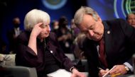 UN Secretary General Antonio Guterres kneels to speak with U.S. Treasury Secretary Janet Yellen at the Annual Meetings of the International Monetary Fund and World Bank in Washington, US, on October 14, 2022. REUTERS/James Lawler Duggan
 