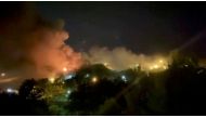 A view of smoke rising from Evin Prison in Tehran, Iran, October 15, 2022 in this still image take from a video obtained by Reuters. 