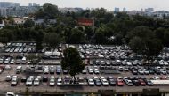 Cars for sale are parked at used car dealerships in Singapore October 17, 2022. REUTERS/Edgar Su