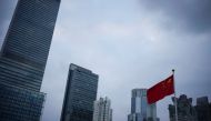 A Chinese national flag is pictured, following the coronavirus disease (COVID-19) outbreak, in Shanghai, China, October 14, 2022. Reuters/Aly Song