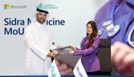 Chief Research Officer of Sidra Medicine Dr. Khalid Fakhro (left) and General Manager of Microsoft Qatar Lana Khalaf at the MoU signing event.