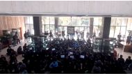 Protesters chant at a vigil for Mahsa Amini, the woman who died in police custody last month, at the entrance hall of the Khajeh Nasir Toosi University of Technology in Tehran, Iran, in this screengrab from social media video released on October 26, 2022 and obtained by REUTERS