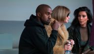 Singer Kanye West watches models rehearse while sitting with his wife Kim Kardashian (right) and Anna Wintour before presenting his Fall/Winter 2015 partnership with Adidas at New York Fashion Week on February 12, 2015. File Photo / Reuters